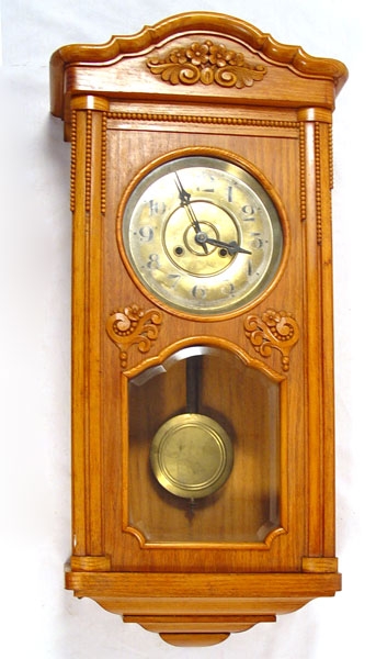 Appraisal: TH CENTURY GUSTAV BECKER WALL CLOCK Wood case with applied