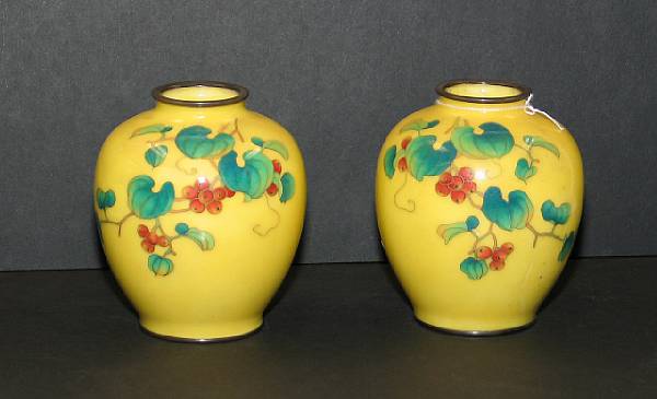 Appraisal: A pair of yellow ground cloisonn enameled metal jars Ando