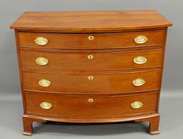 Appraisal: New England Federal cherry bow-front chest c h x w