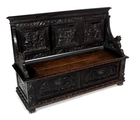 Appraisal: A Victorian carved stained oak bench the moulded top-rail over