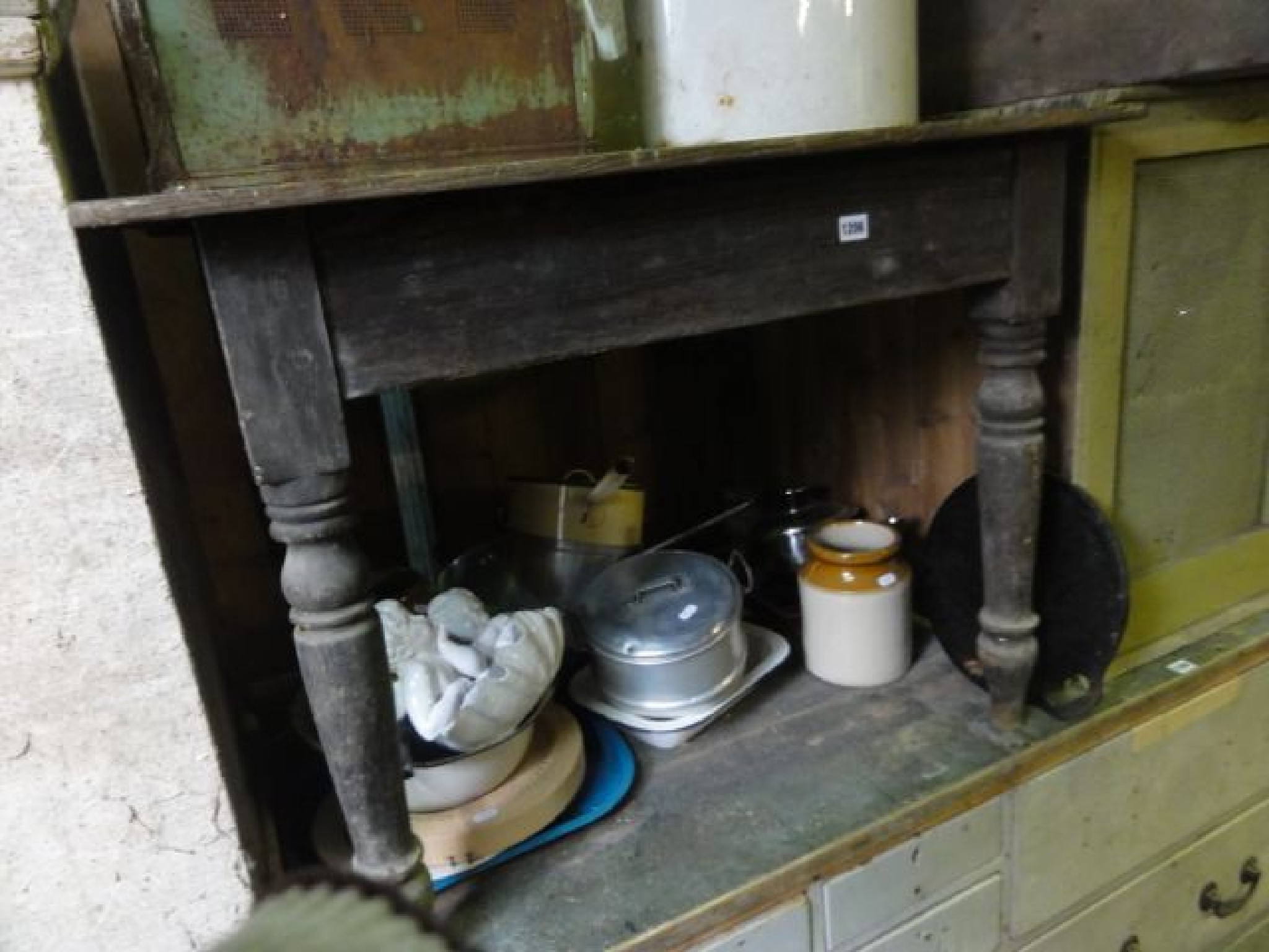 Appraisal: A small Victorian stained pine kitchen table of rectangular form