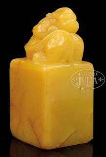 Appraisal: CARVED STONE SEAL China th century Stone of amber color