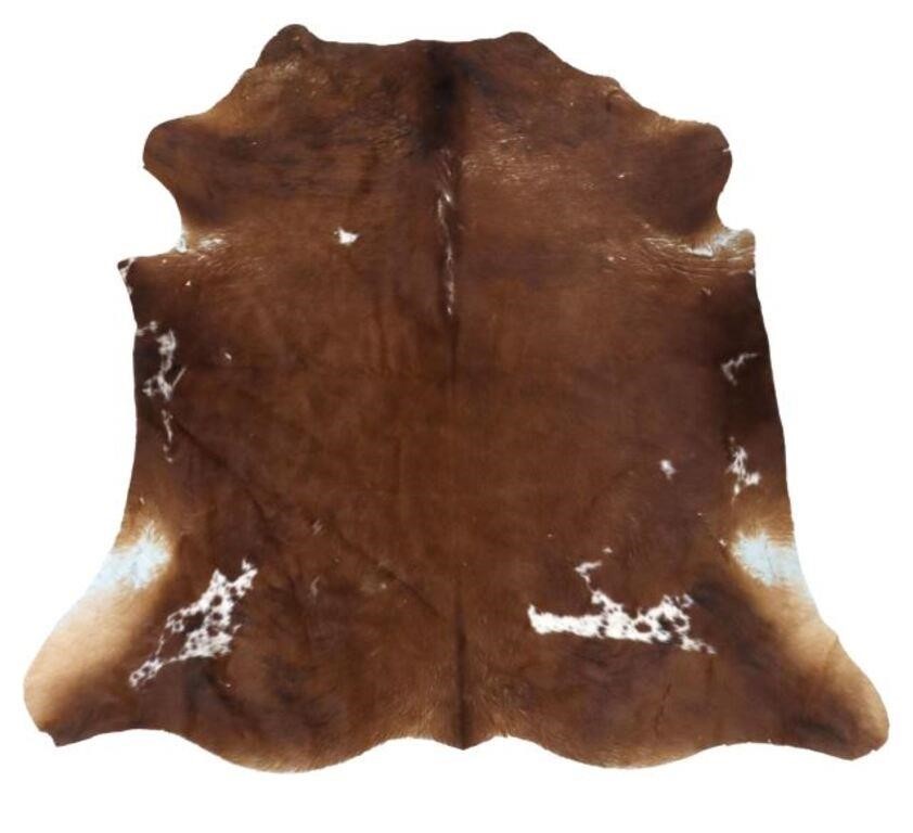 Appraisal: Large cow hide brown black and white some hair loss