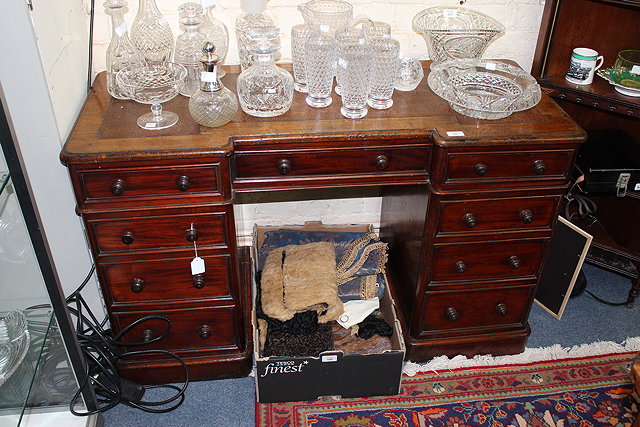 Appraisal: A VICTORIAN MAHOGANY BREAK FRONT PEDESTAL DESK with leatherette inset