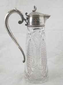 Appraisal: Faberge A Russian silver mounted claret jug the body hobnail