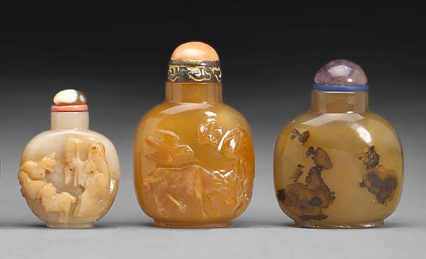 Appraisal: Three agate snuff bottles Late Qing Republican Period The first