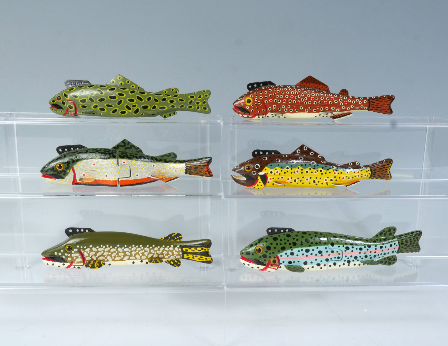 Appraisal: SIX JIM NELSON HAND-CARVED AND PAINTED FISH DECOYS Frog-Colored Trout