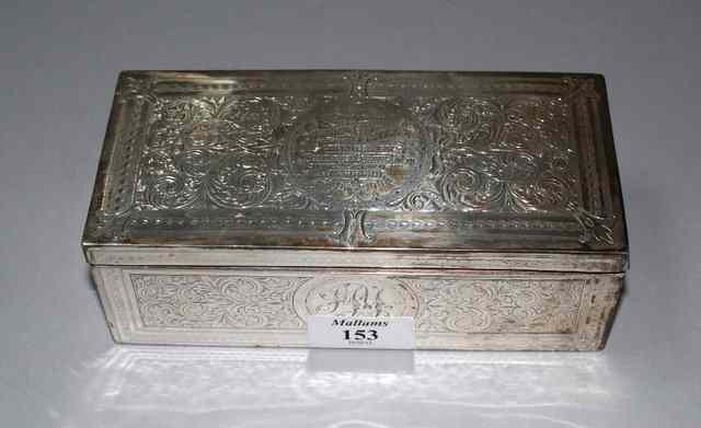 Appraisal: A LATE VICTORIAN SILVER CIGARETTE BOX rectangular shaped with scroll