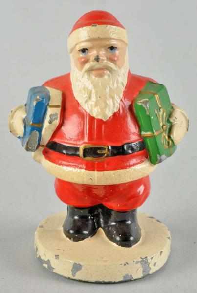 Appraisal: White Metal Hubley Santa Paperweight Condition Excellent Size - T