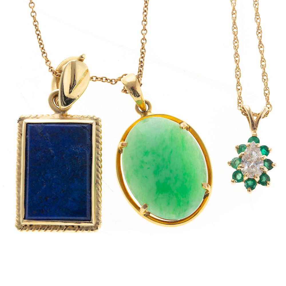 Appraisal: A Pair of Gold Chains and Gemstone Pendants K yellow