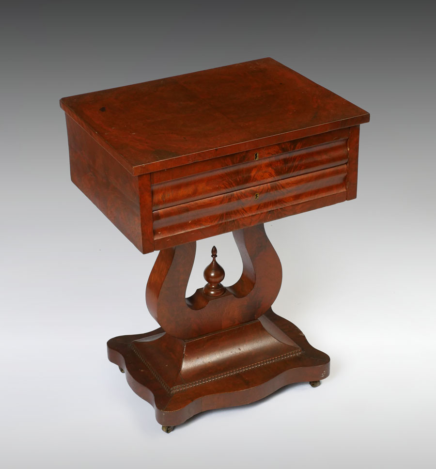 Appraisal: EMPIRE MAHOGANY LYRE DRAWER WORK TABLE Richly grained mahogany veneer