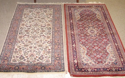 Appraisal: TWO HAND KNOTTED ORIENTAL AREA RUGS Indo-Persian including a '