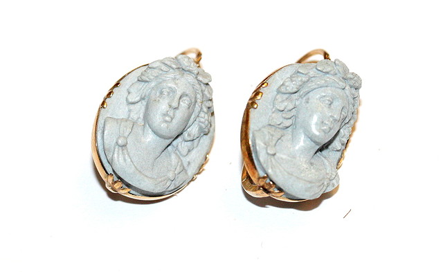 Appraisal: A PAIR OF VICTORIAN CARVED LAVA STONE CAMEO EARRINGS of