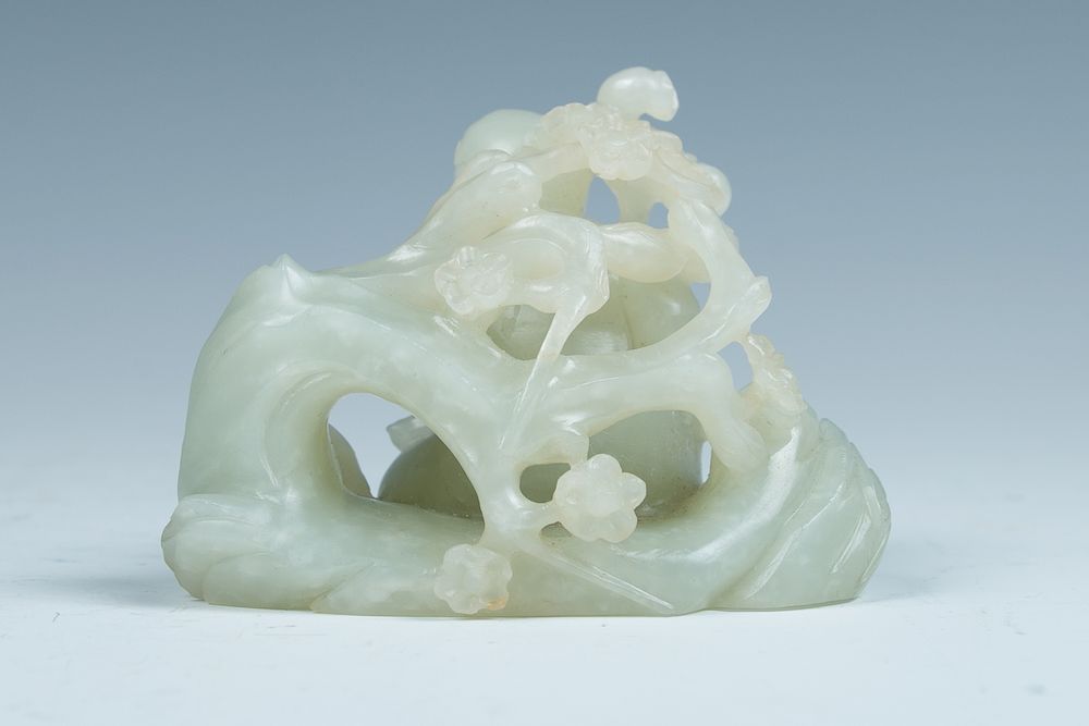 Appraisal: A JADE IMMORTAL CARVING Carved with a jade immortal figure