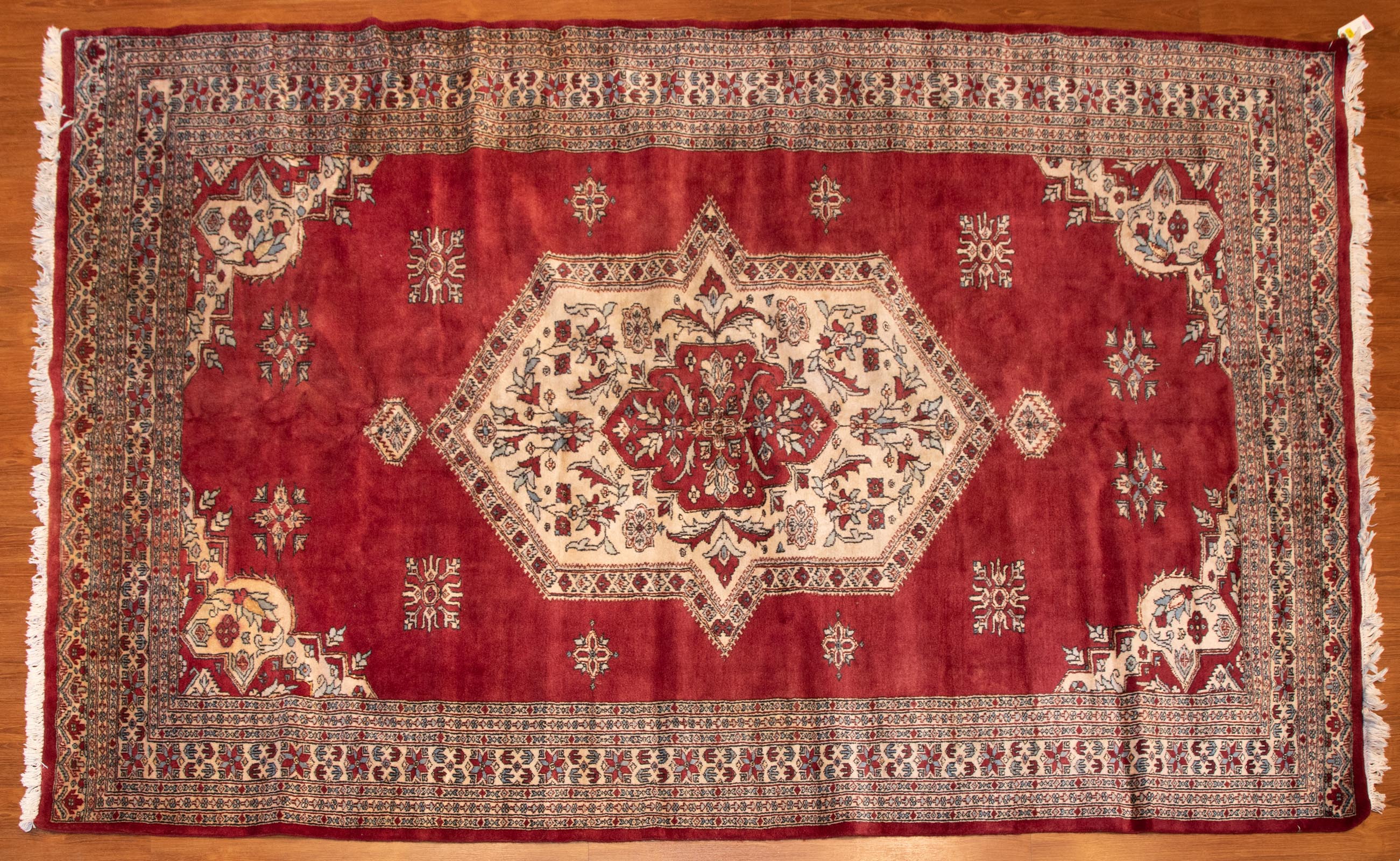 Appraisal: PERSIAN DESIGN RUG PAKISTAN X Fourth quarter- th century hand-knotted