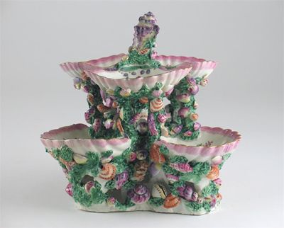 Appraisal: A Worcester two-tiered scallop shell sweetmeat dish painted with flowers