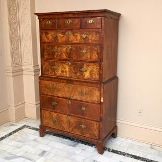 Appraisal: George II figured walnut chest-on-chest c England cove-molded cornice bracket