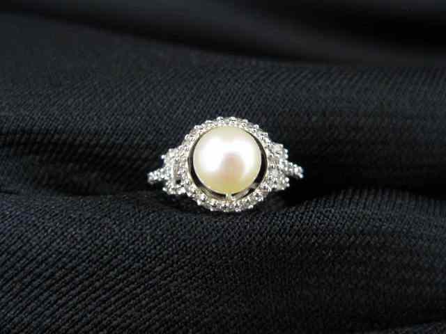 Appraisal: Diamond Pearl Ring fine mm pearl surrounded by diamonds in