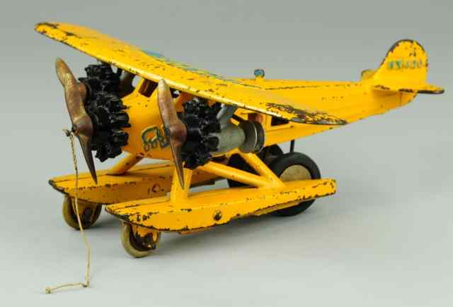 Appraisal: HUBLEY FRIENDSHIP AIRPLANE C cast iron painted in yellow overall