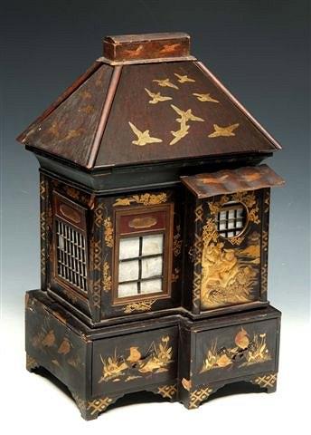 Appraisal: A JAPANESE WOODEN GAMES BOX in the form of a