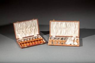 Appraisal: Two Boxes of Spoons Two leather-cased sets of eight silver-plated