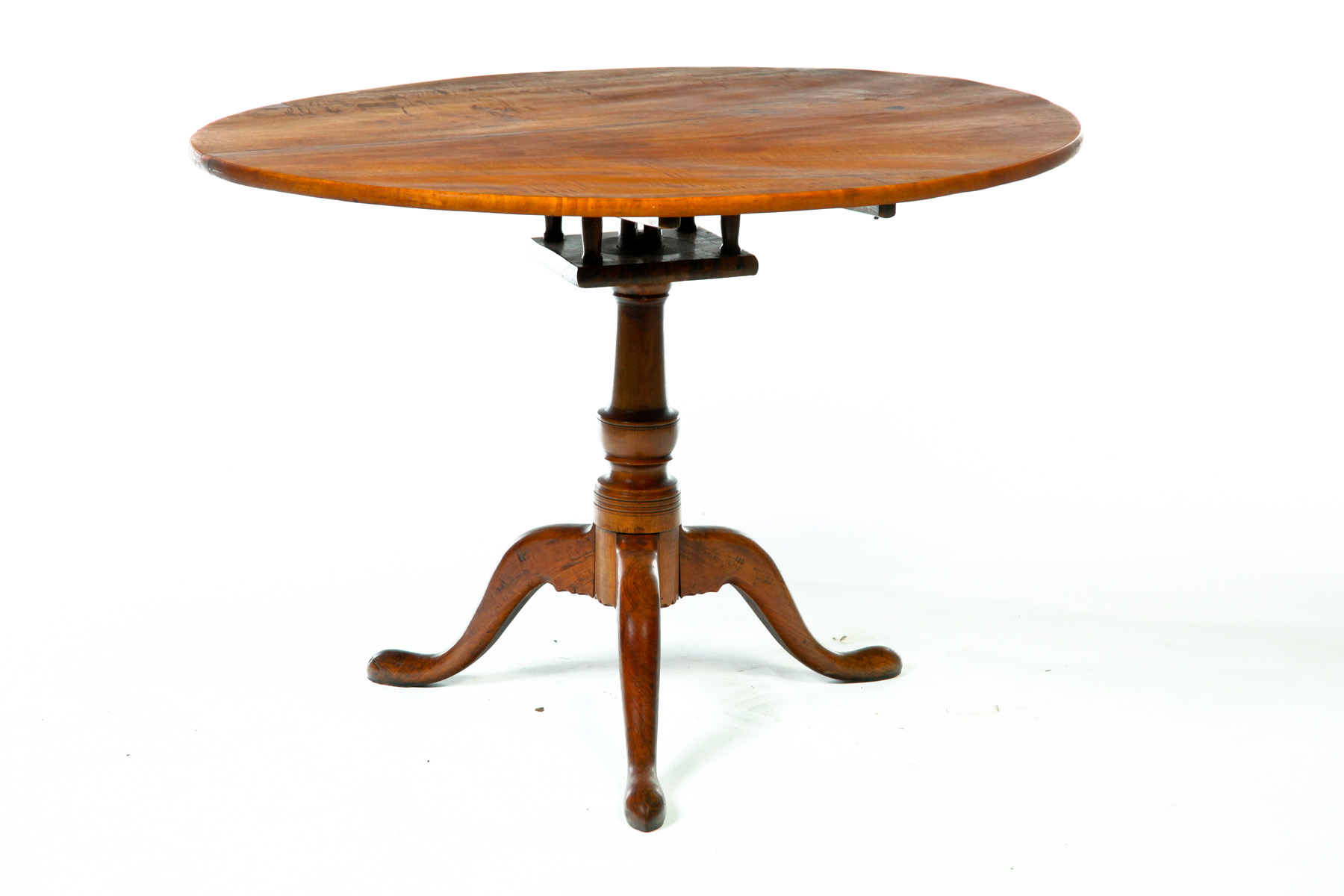 Appraisal: BIRDCAGE TILT-TOP TEA TABLE American ca flame birch Turned center