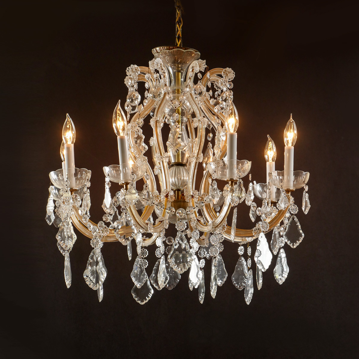 Appraisal: LIGHT SCROLLING CRYSTAL CHANDELIER light chandelier having scrolling crystal arms