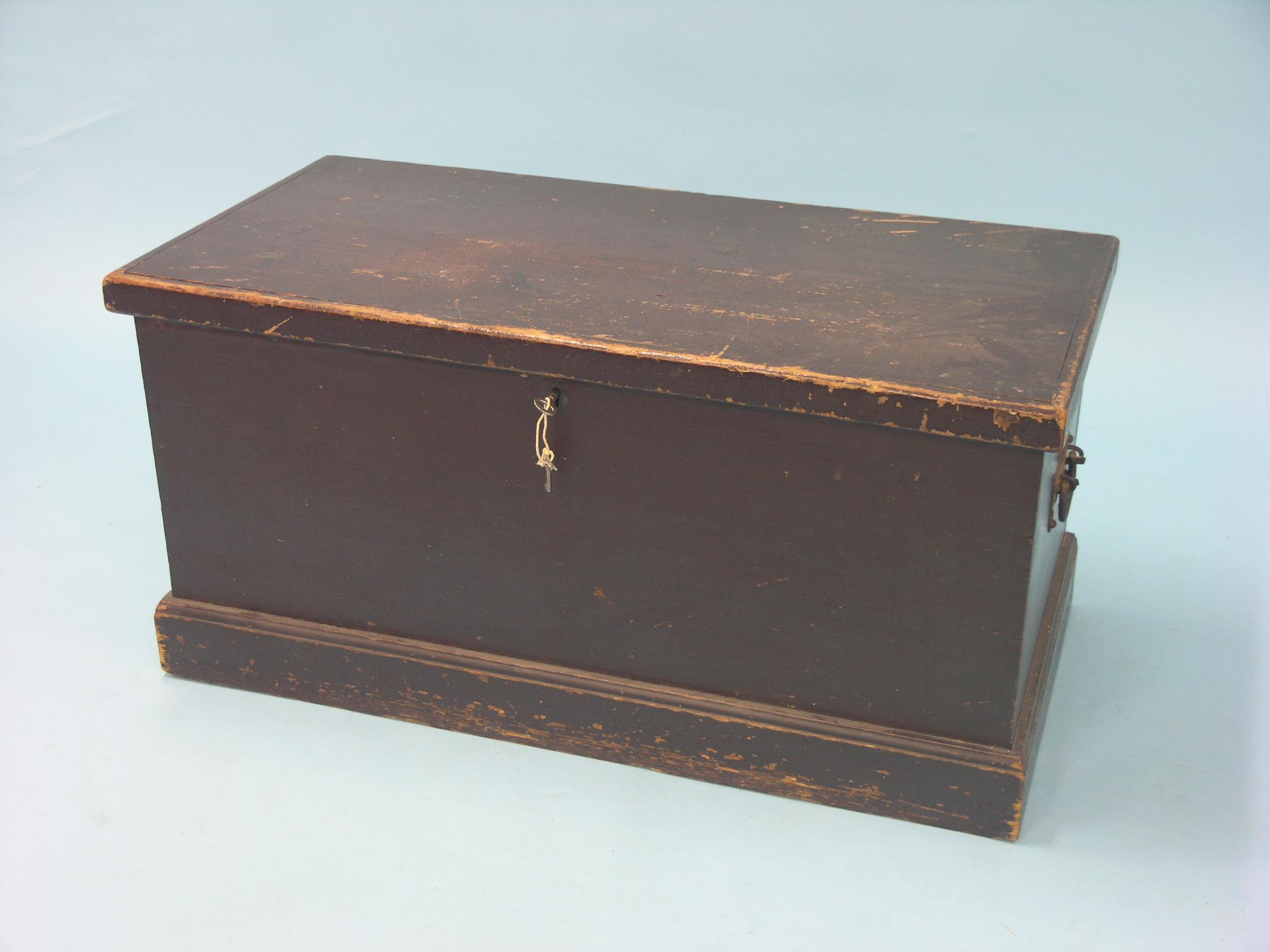 Appraisal: A Victorian painted pine trunk boarded construction with enclosed candle-tray