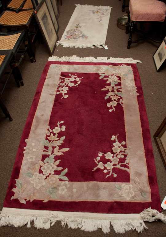 Appraisal: Two Chinese tufted scatter rugs Estimate - All property is