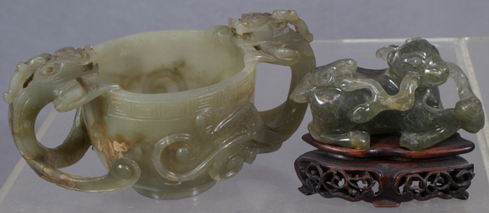 Appraisal: Archaic form Chinese carved hardstone cup with dragon handles approximately