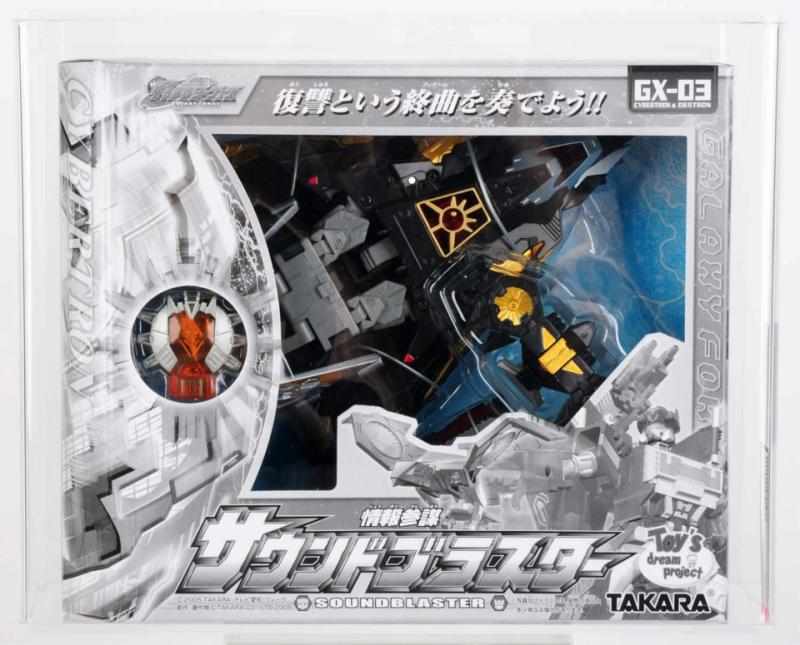 Appraisal: Transformers Galaxy Soundblaster GX- AFA Takara Sleek black Soundblaster was