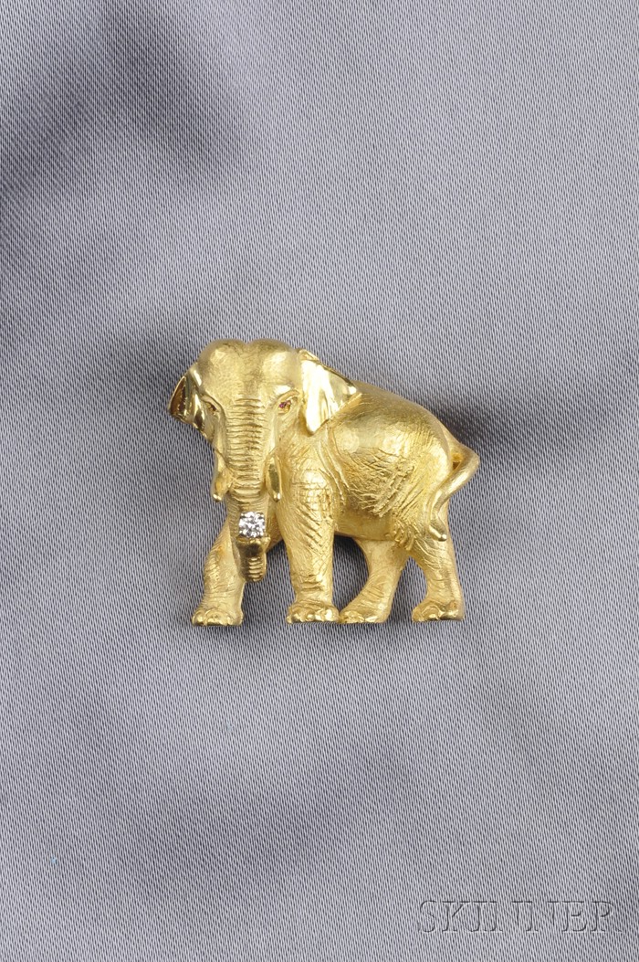 Appraisal: kt Gold and Diamond Elephant Brooch with ruby eyes holding