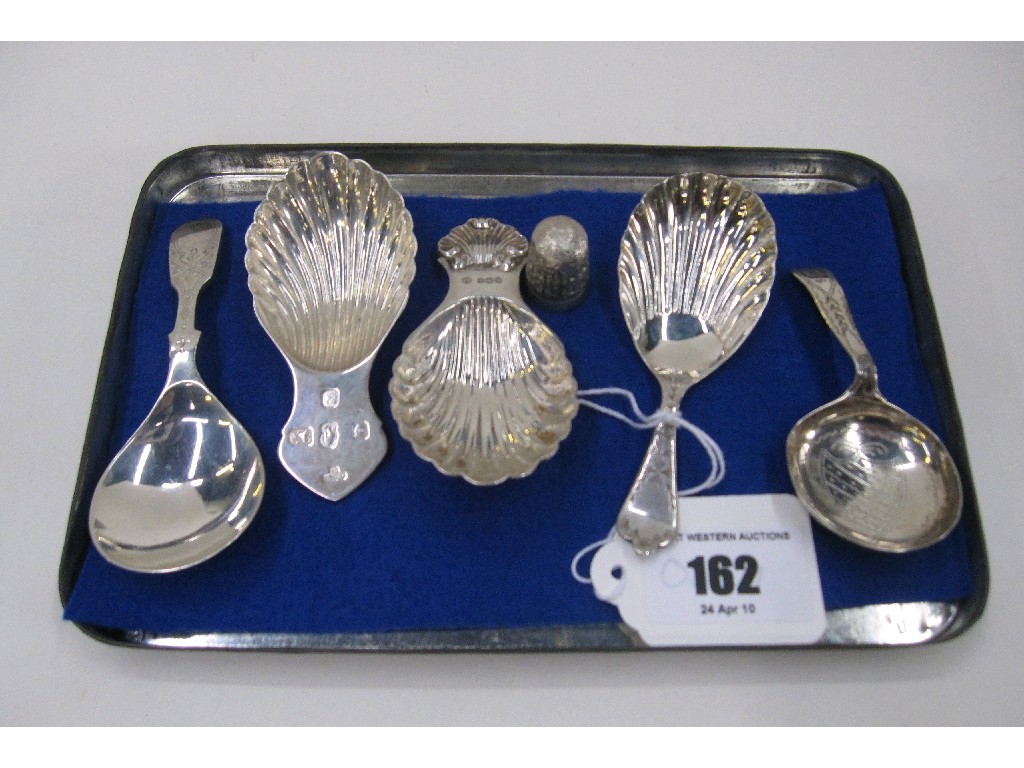 Appraisal: Lot comprising three modern silver caddy spoons one Sheffield another