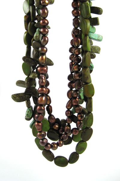 Appraisal: BEADED MULTI-STRAND NECKLACE with turquoise howlite beads and bronze pearls