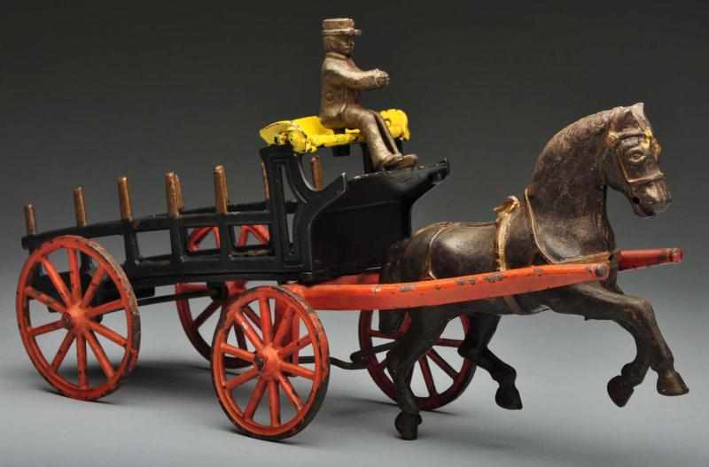 Appraisal: Cast Iron Ives Balancing Horse Dray Wagon Toy Description American