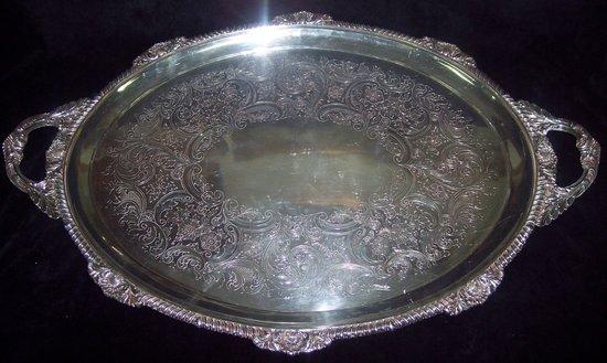 Appraisal: A late Victorian oval two-handled tray with shell and gadroon