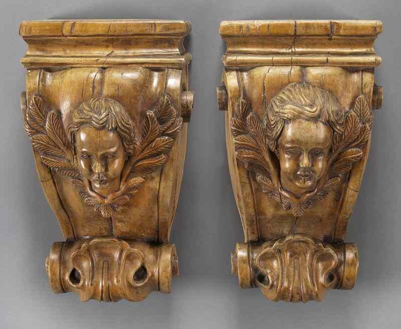 Appraisal: Pr Continental carved wood wall mounts the front carved with