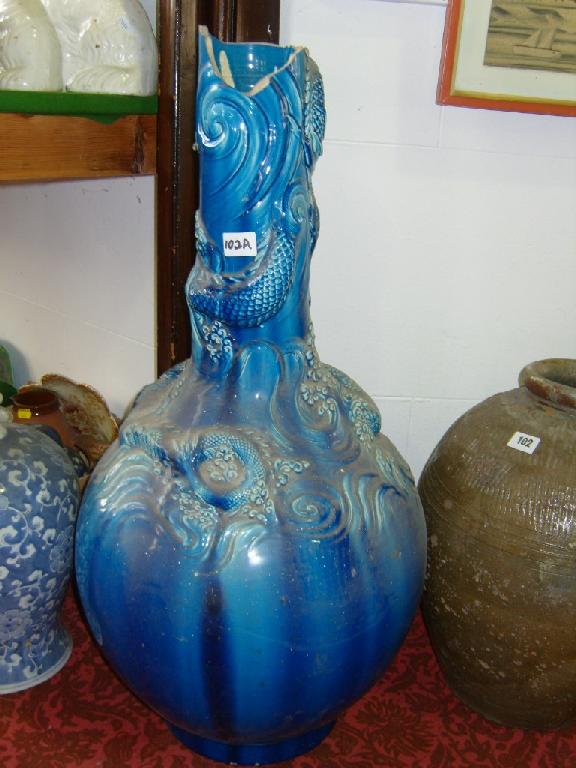 Appraisal: A substantial late th century blue glazed majolica type vase