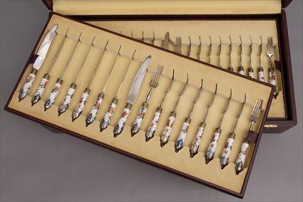 Appraisal: CONTINENTAL SEVENTY-TWO PIECE PORCELAIN-HANDLED FLATWARE SERVICE In Imari pattern with