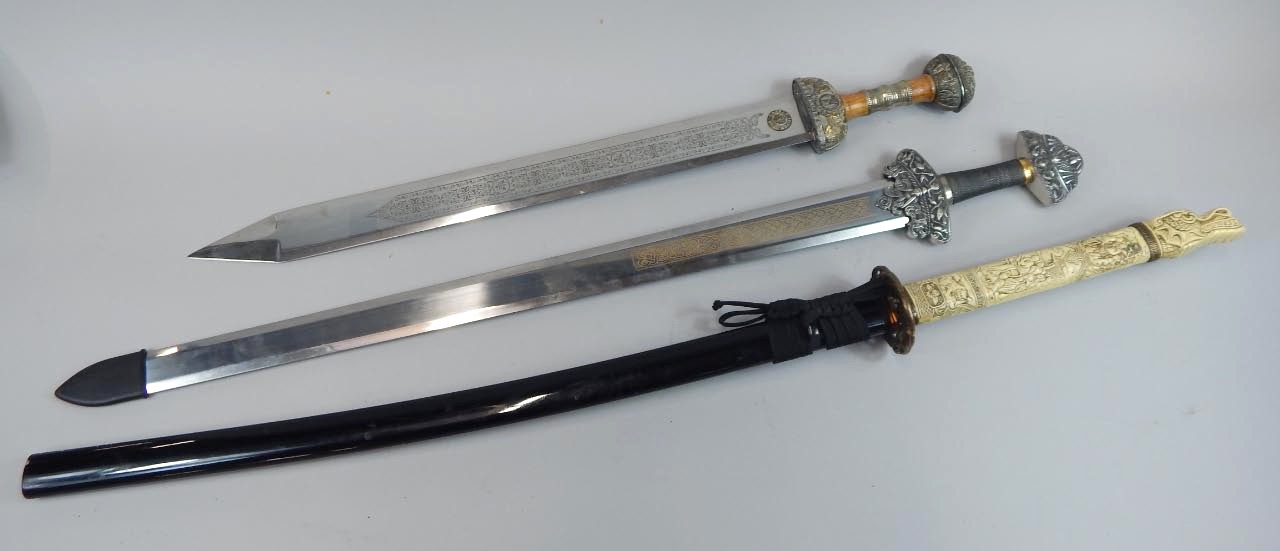 Appraisal: Two replica Roman Empire Gladius swords with a replica Japanese