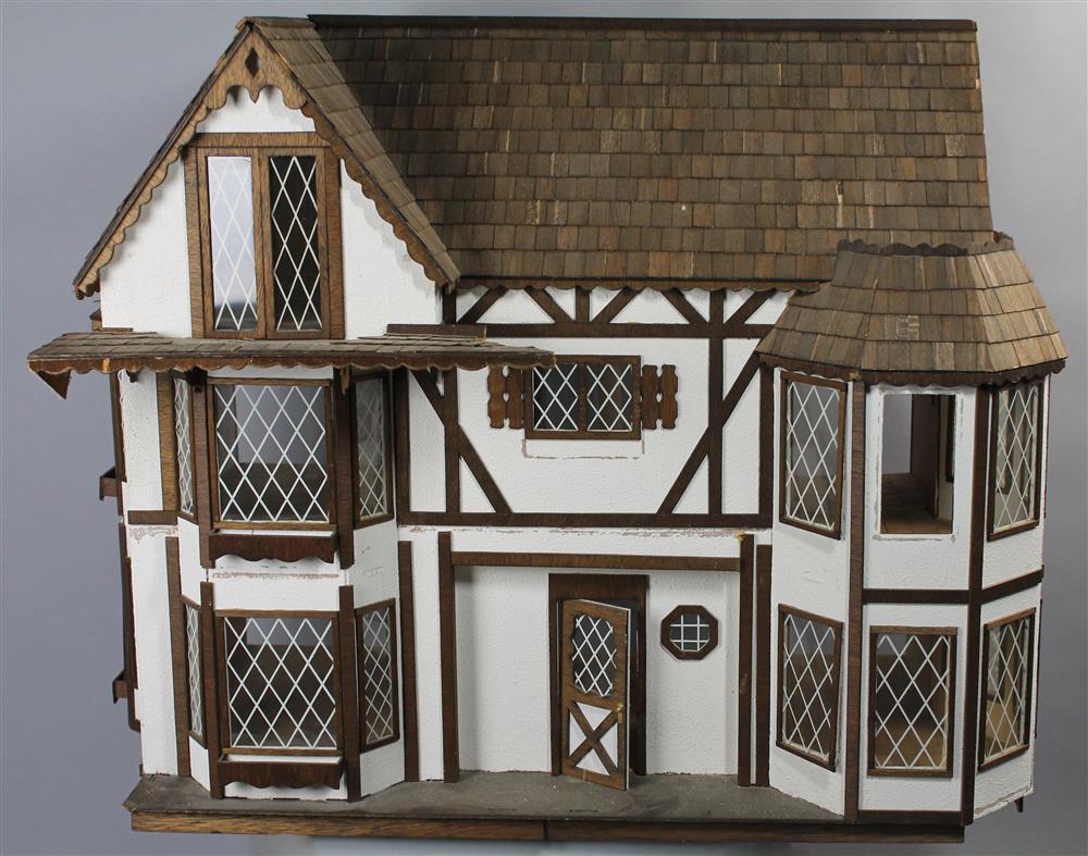 Appraisal: CONTEMPORARY TUDOR DESIGN DOLLHOUSE ready to move in - English