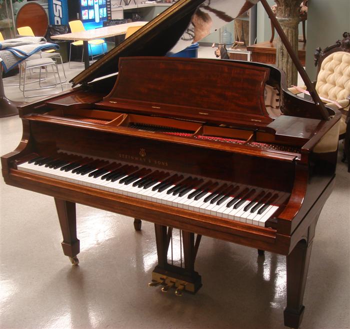 Appraisal: Steinway Model L grand piano mahogany case c with bench