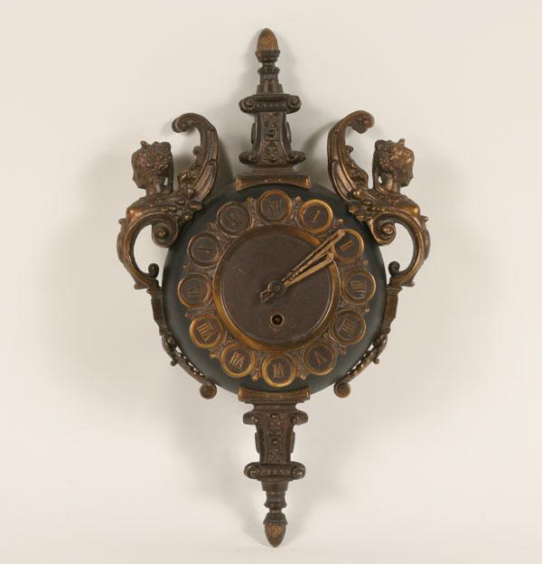 Appraisal: German metal key wind clock ebonized circular body with applied