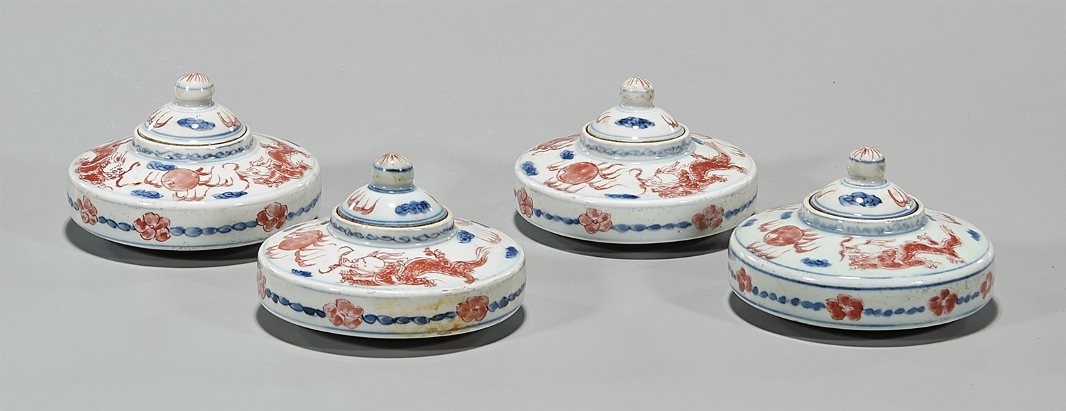 Appraisal: Four Chinese red blue and white porcelain covered water pots