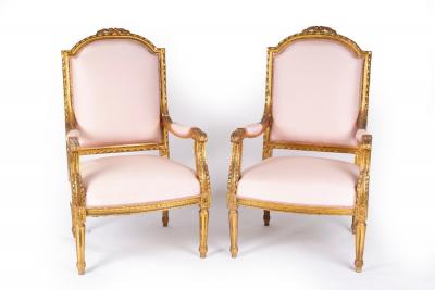 Appraisal: A pair of fauteuils with carved and moulded frames floral