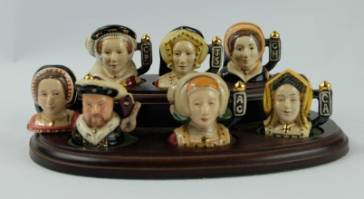 Appraisal: A set of Royal Doulton tiny character jugs comprising Henry