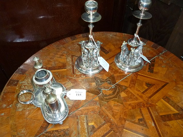 Appraisal: A PAIR OF OLD SILVER PLATED CANDLESTICKS with turned stems