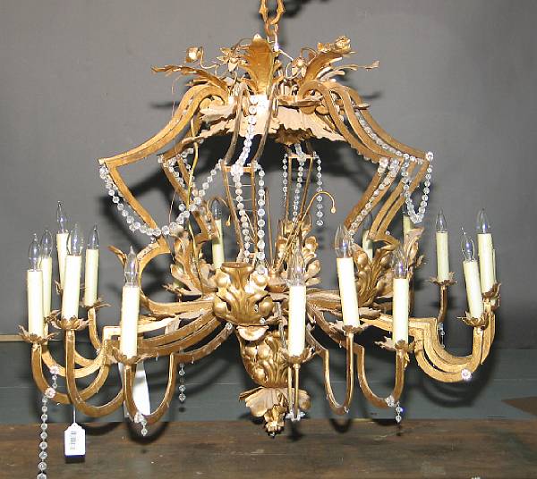 Appraisal: A Rococo style glass and gilt metal eighteen light chandelier