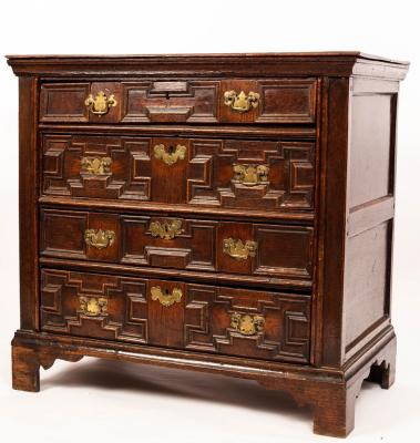 Appraisal: A th Century oak chest with plain rectangular top fitted