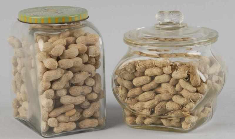 Appraisal: Lot of Planters Peanuts Store Jars Description The Leap Year